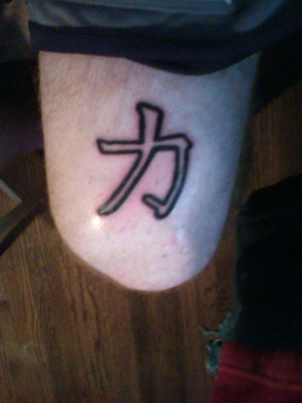 Chinese Strength Outline Tattoo On Thigh