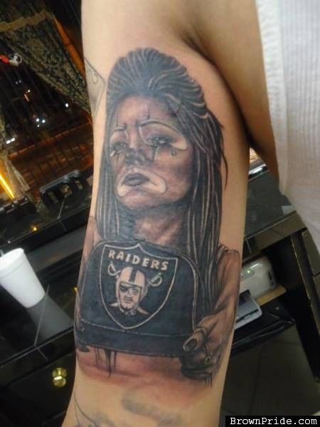 Clown Girl With Oakland Raiders Logo Tattoo On Half Sleeve