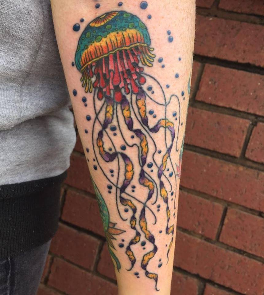 Colored Jellyfish Tattoo On Left Sleeve by Kyle Kemp