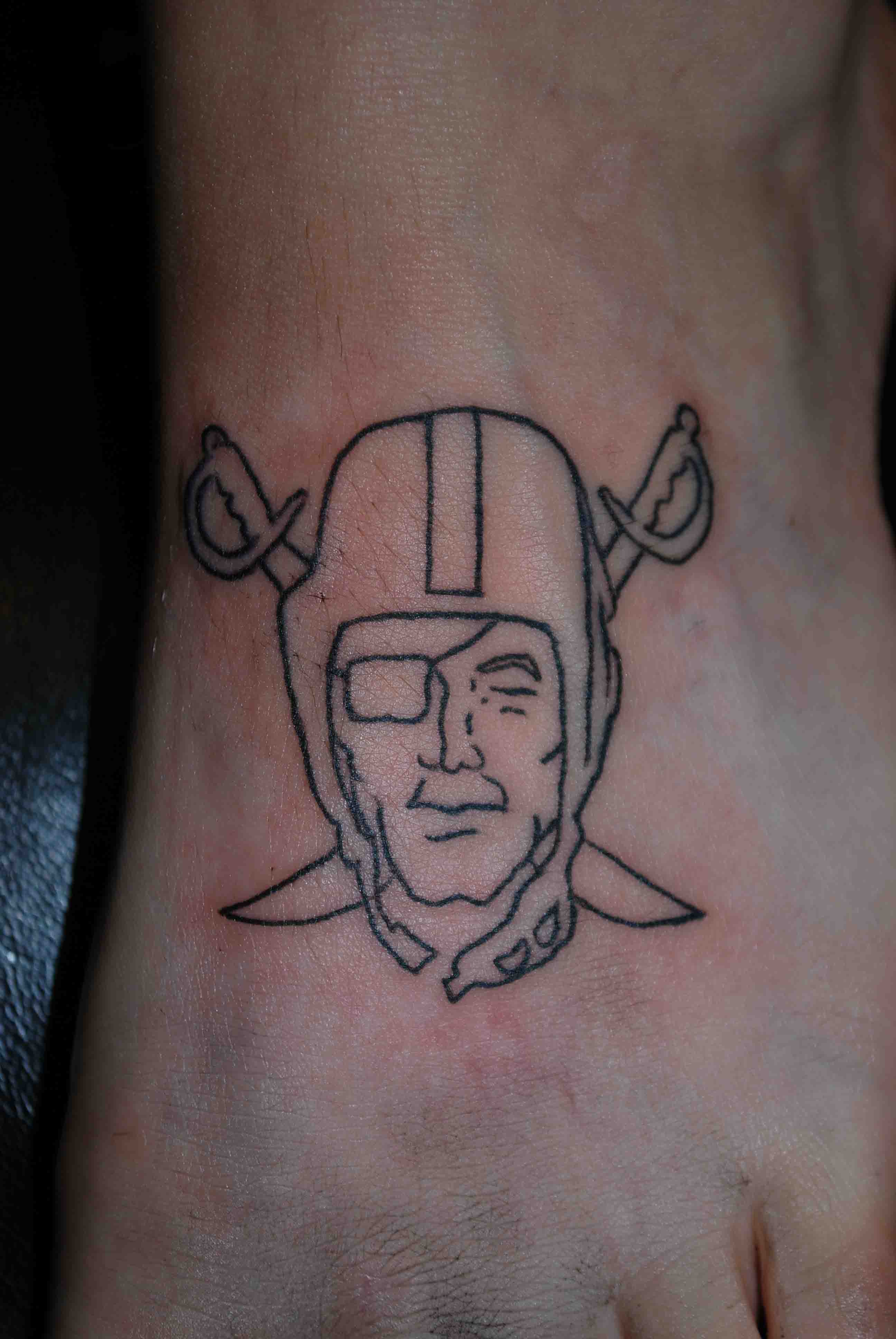 Colorless Oakland Raiders Tattoo On Foot