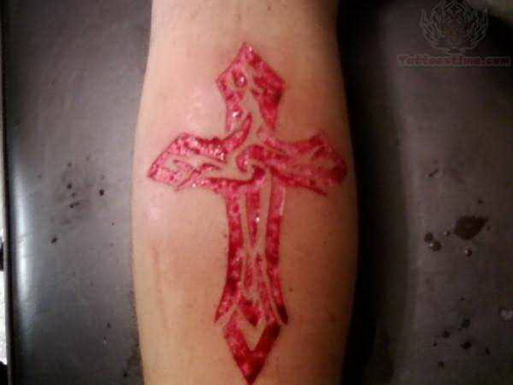 Cross Scarification Tattoo On Forearm