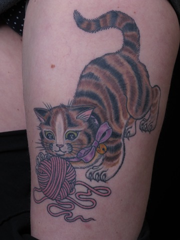 Cute Cat With Yarn Ball Tattoo On Thigh