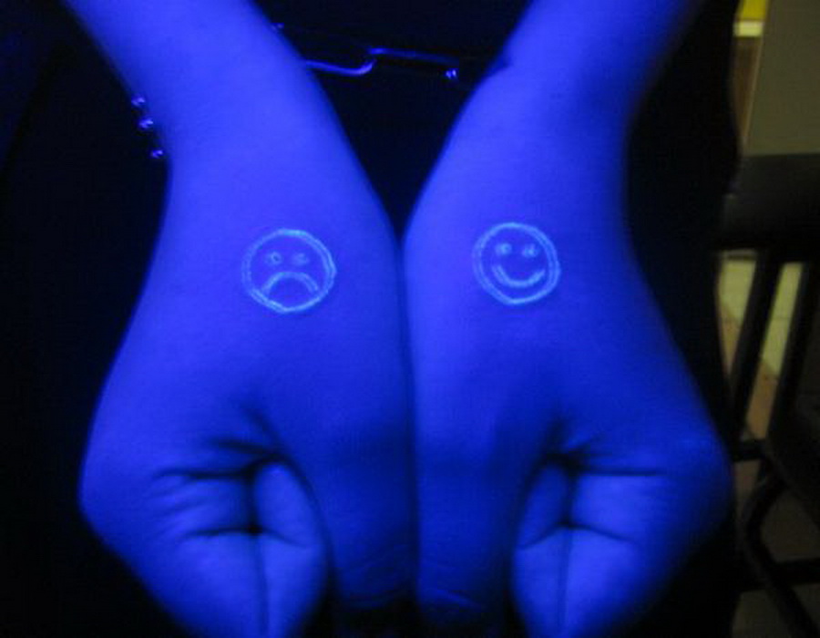 Cute Smile And Sad Emotion UV Tattoos On Both Hands
