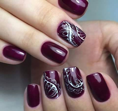 Dark Purple Glossy Nails With White Floral Design Idea