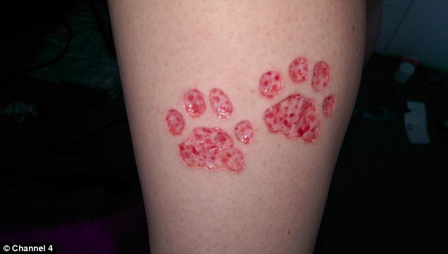 Dog Paw Scarification Tattoo