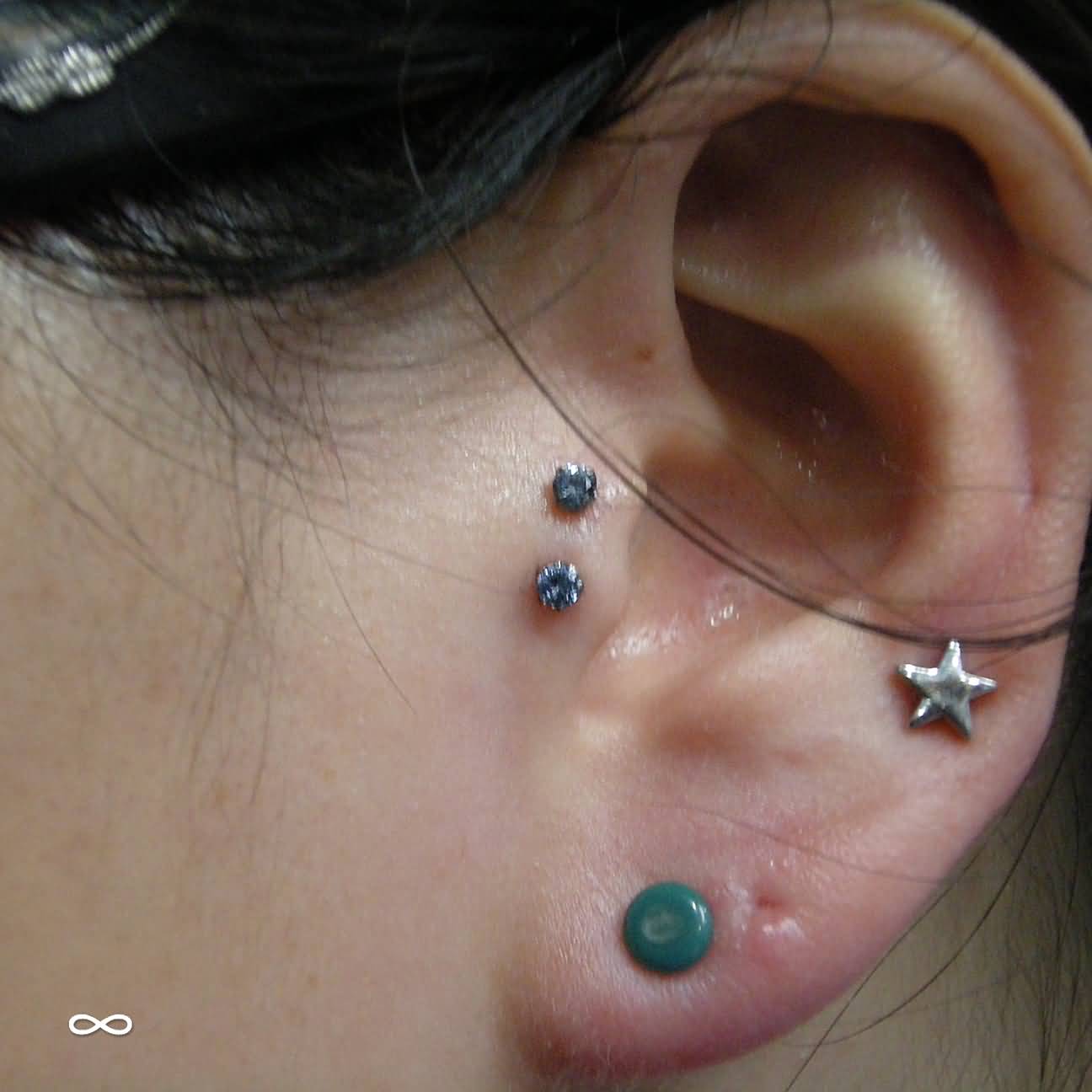 Double Tragus Piercing With Blue Gem stone Studs
