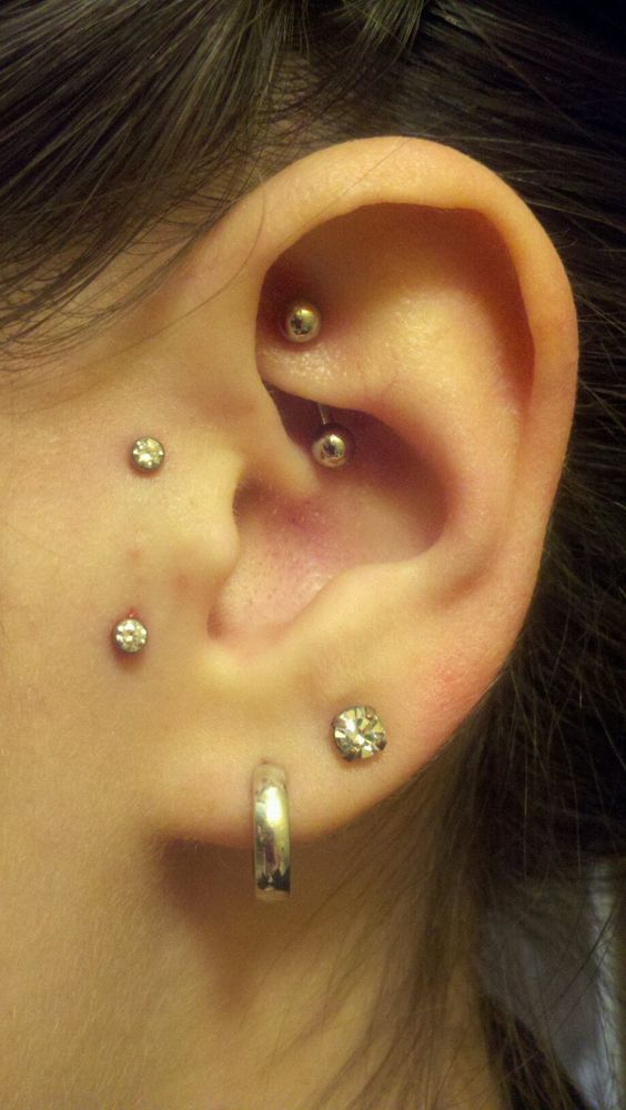 Dual Lobes And Dual Tragus Piercing With Diamond Studs