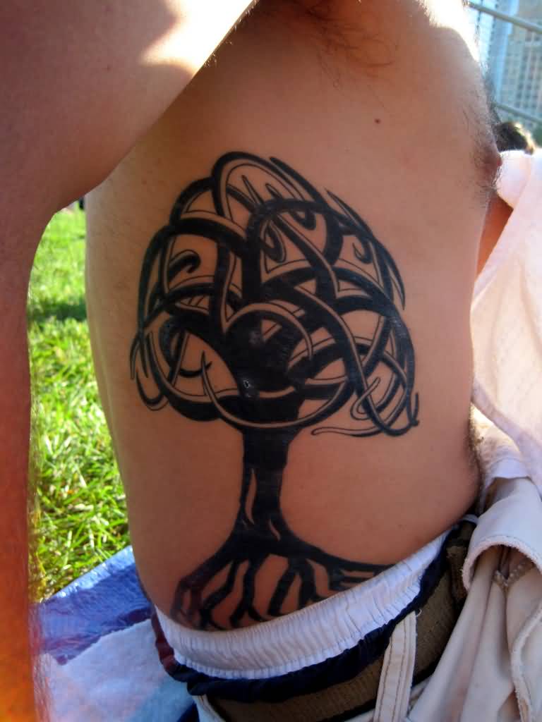Escher Twon Tree Tattoo On Side Rib