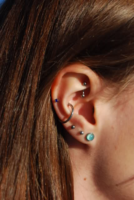 Girl With Ear Project Piercing