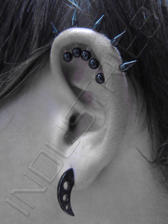 Girl With Left Ear Lobe And Ear Project Piercing