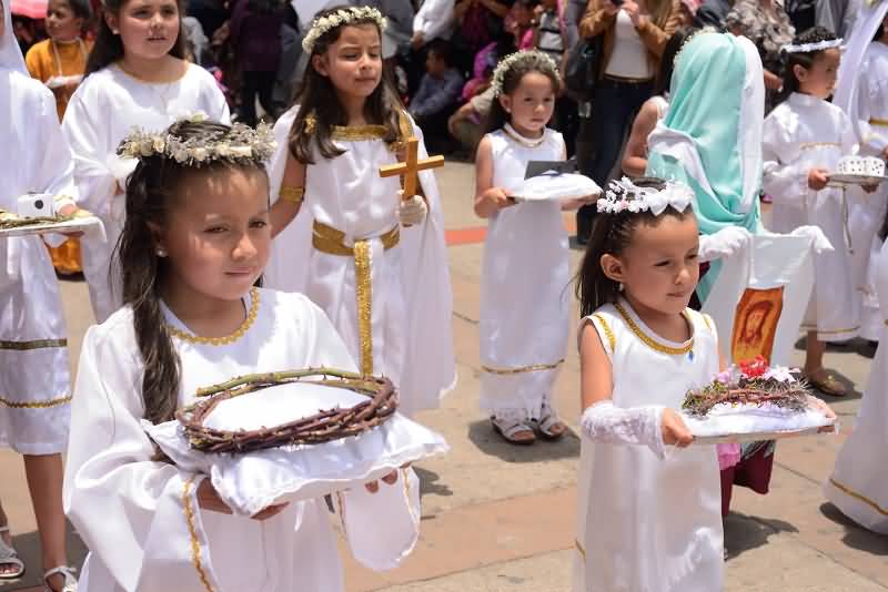 Girls Taking Part In Parade During The Celebration Of Assumption Of Mary