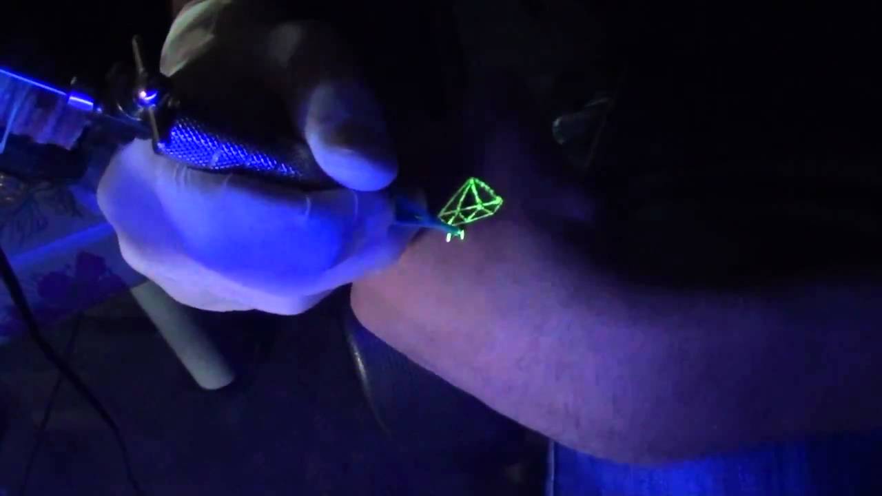 Green Ink Small Diamond UV Tattoo On Arm