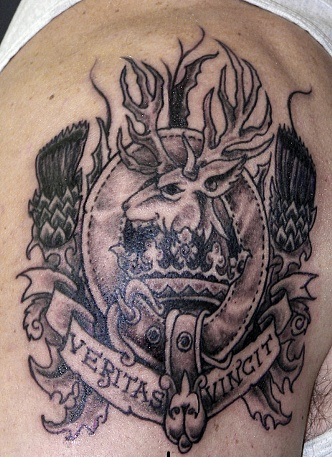 Grey And Black Pagan Symbol Tattoo On Shoulder