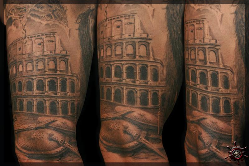 Grey Ink Colosseum And Weapons Tattoo On Arm