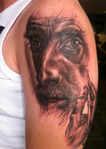 Grey Ink Escher Face Tattoo On Left Half Sleeve
