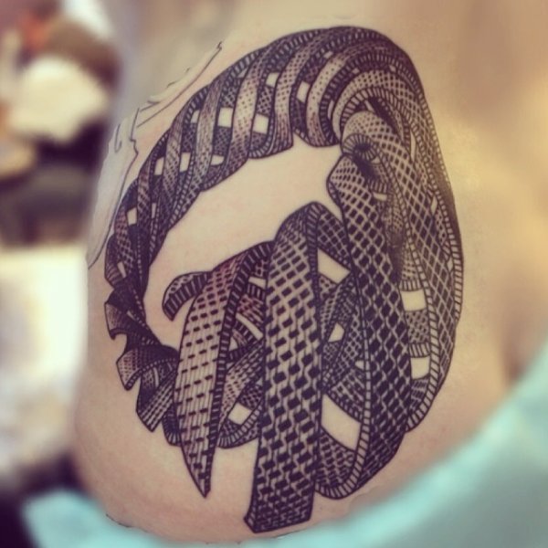 Grey Ink Escher Tattoo On Shoulder
