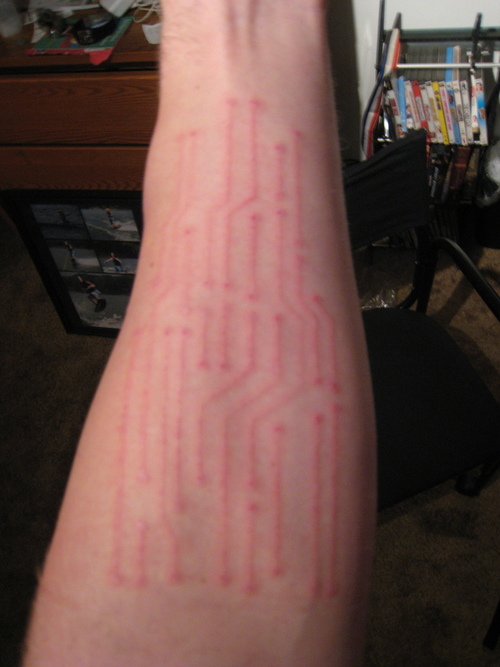 Healing Circuit Board UV Tattoo On Forearm