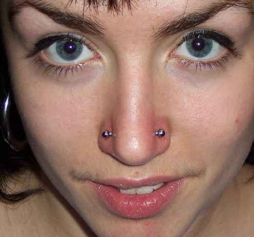 High Nostril Piercing With Silver Barbell