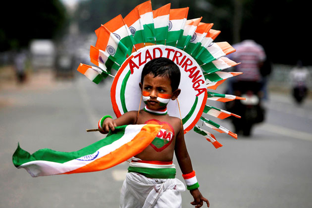 Indian Kid Selling Flags On Independence Day Of India