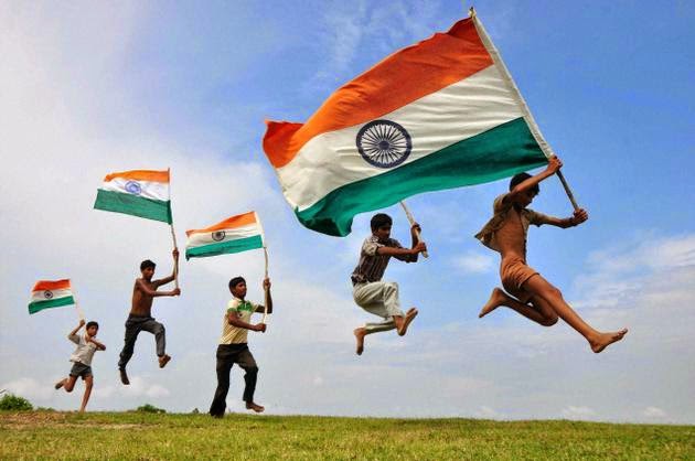 Kids Running With Indian Flags On Independence Day