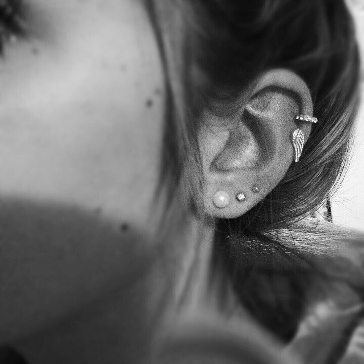 Left Cartilage And Triple Earlobe Piercing