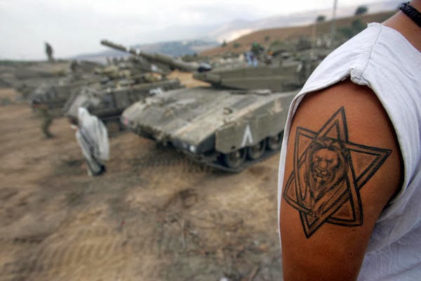 Lion Surrounded By Star Of David Tattoo On Right Shoulder
