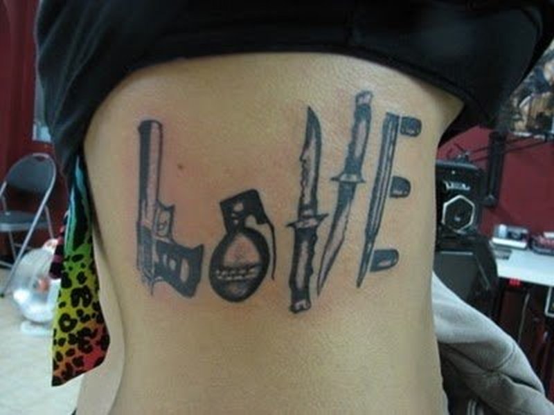 Love Weapons Tattoo On Side Rib For Girls