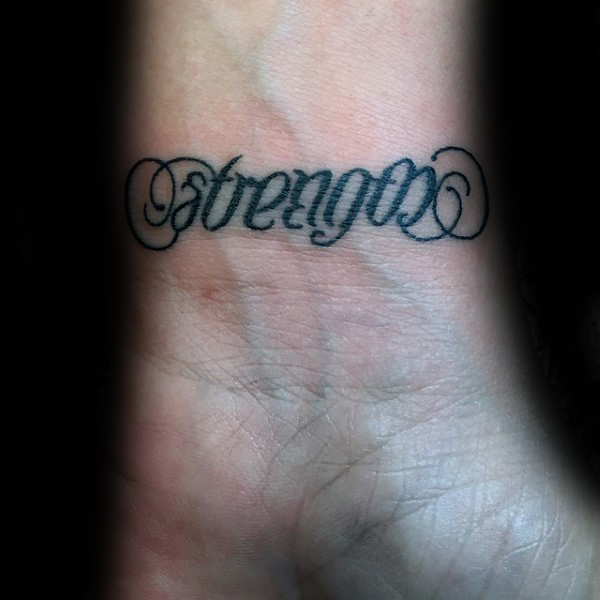 Lovely Ambigram Strength Wrist Tattoo
