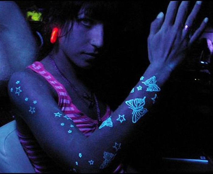 Lovely Butterflies And Stars UV Tattoo On Full Sleeve For Girls