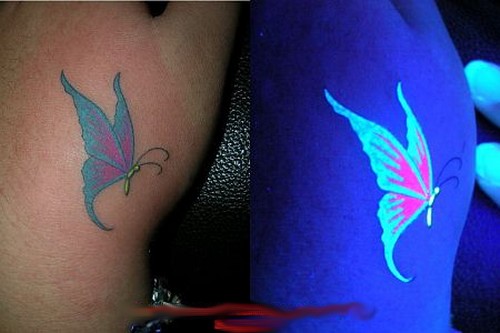 Lovely Butterfly Tattoo In Daylight And Blacklight On Left Hand