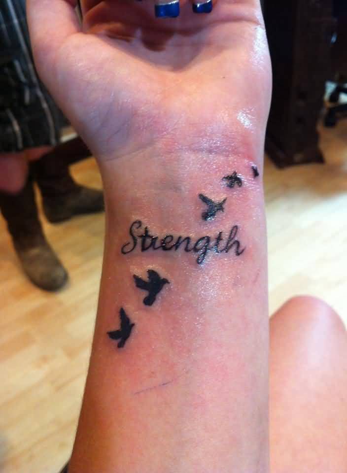 Lovely Strength With Flying Birds Tattoo On Wrist For Girls