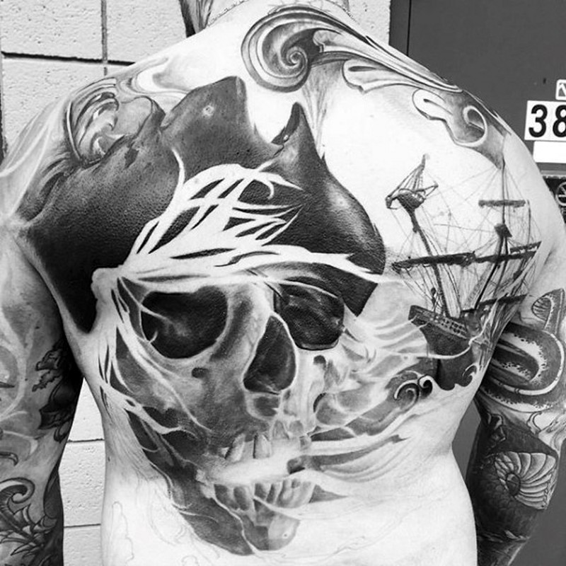 Magnificent Pirate Skull And Ship Tattoo On Back