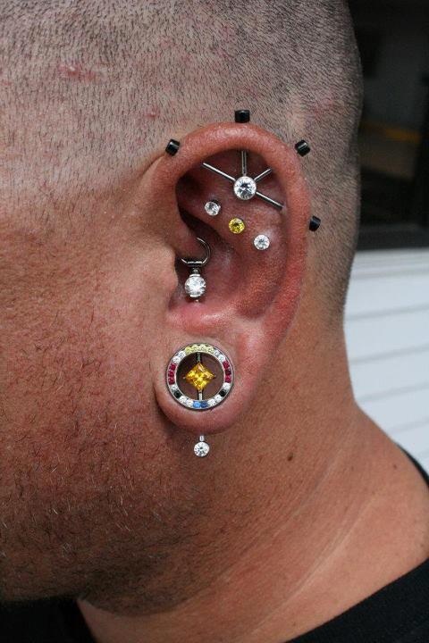 Man With Ear Project Piercing On His Left Ear
