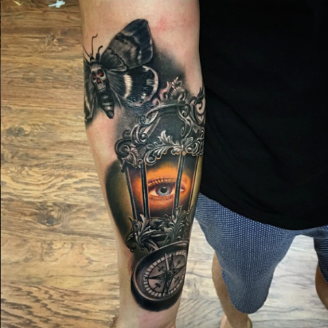 Moth With Lamp And Compass Tattoo On Right Forearm by Rember Orellana