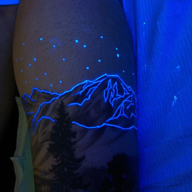 Mountains And Stars UV Tattoo On Arm