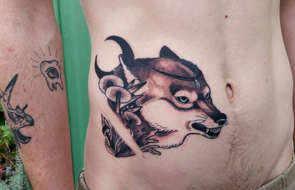 Mushrooms And Wolf Head Tattoo On Right Hip by Amanda Toner