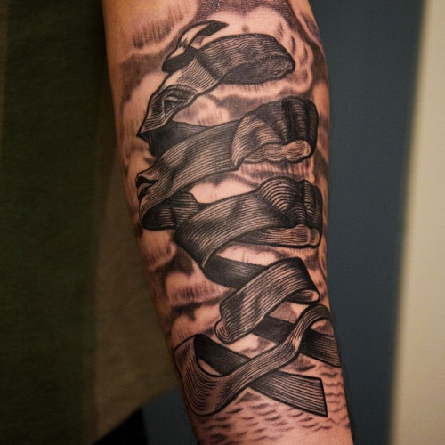 Nice Escher Rind Illusion Tattoo On Forearm