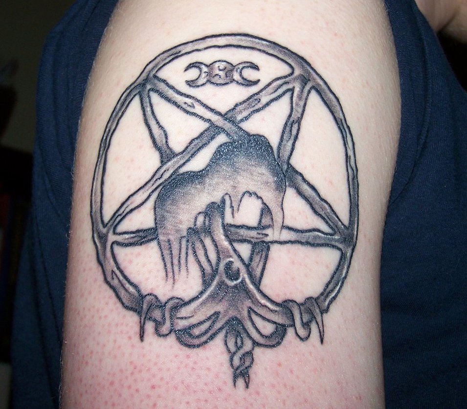 Nice Grey Pagan Tattoo On Right Shoulder