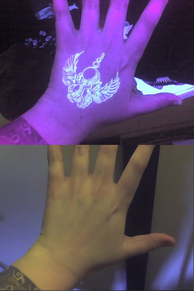 Nice Hand Scarab UV Tattoo On Hand By AlixBranwyn