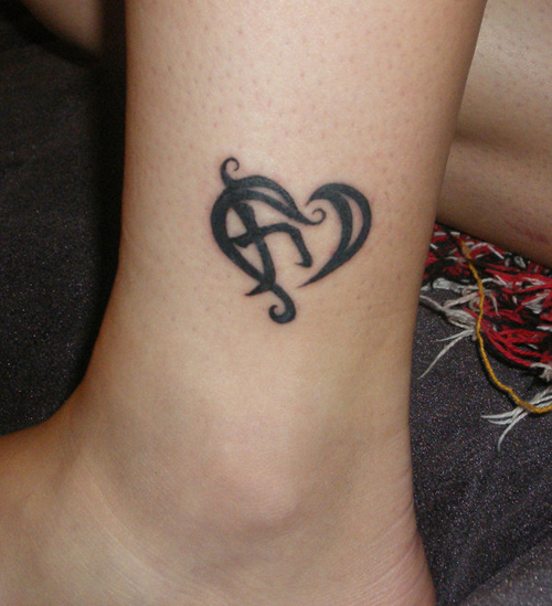Nice Small Strength Heart Tattoo On Ankle