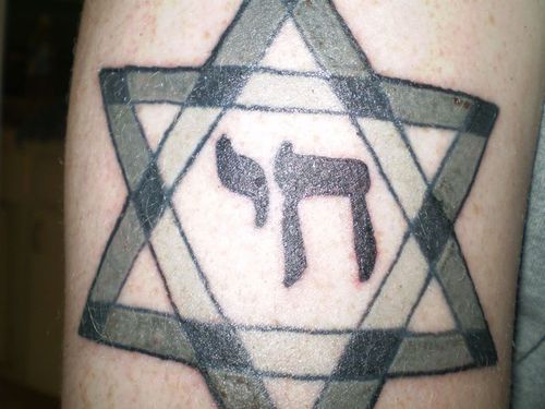 Nice Star Of David And Hebrew Tattoo