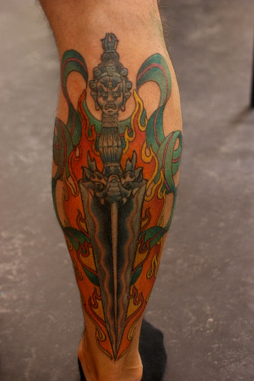Nice Tibetan Dagger Tattoo On Leg