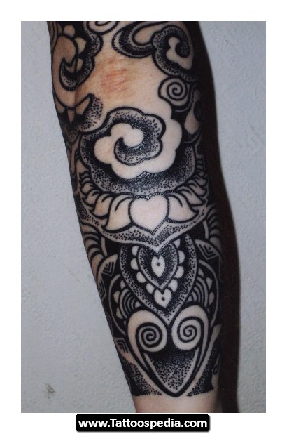 Nice Tibetan Symbol Tattoo On Arm