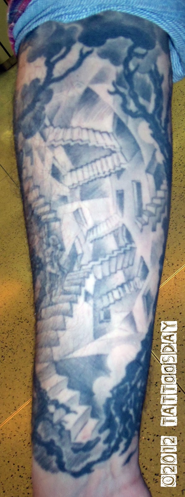 Nice Trees And Stairs Escher Tattoo On Arm