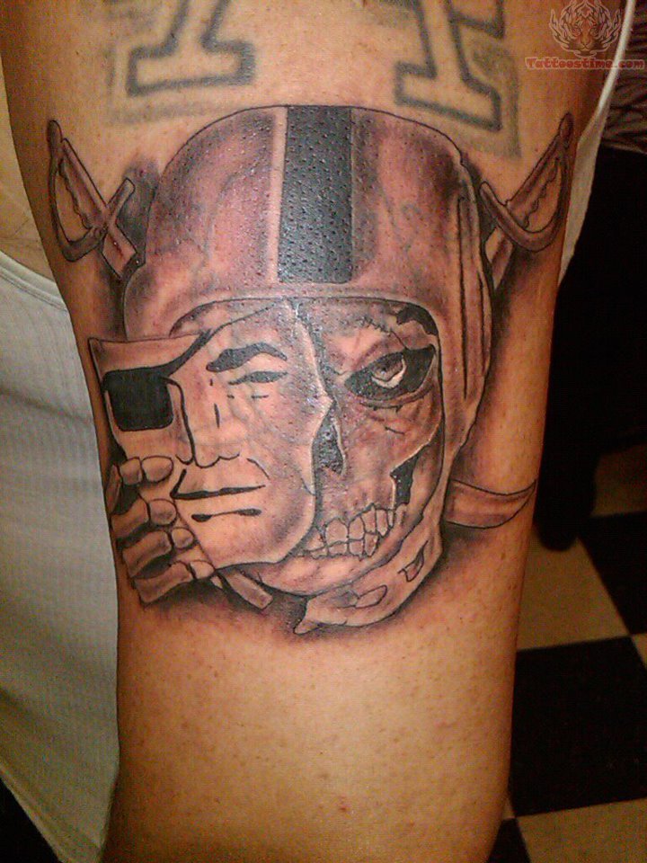 Oakland Raiders Mask Tattoo On Left Half Sleeve