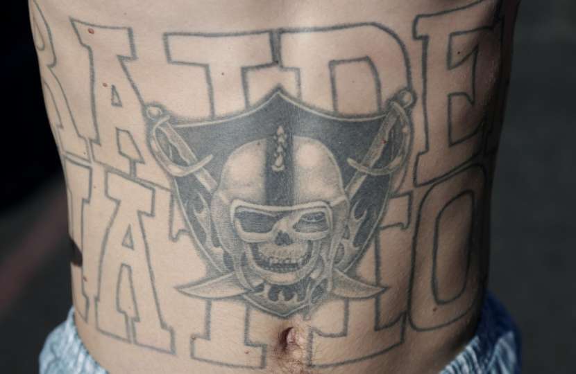 Oakland Raiders Words With Logo Tattoo On Stomach