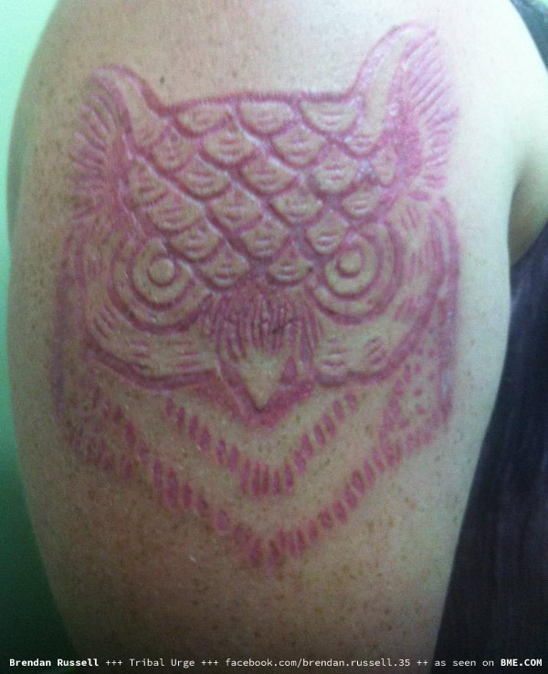 Owl Scarification Tattoo