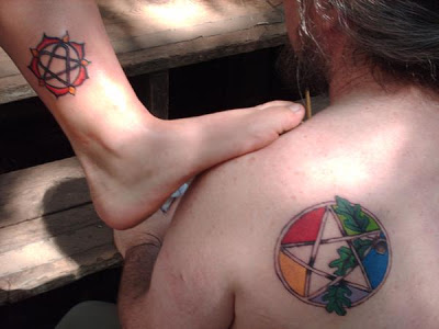 Pagan Colorful Tattoo On Back Shoulder And Ankle
