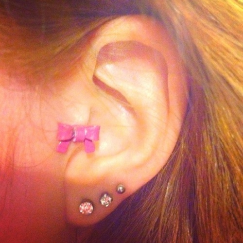 Pink Bow Stud Tragus And Triple Earlobe Piercing
