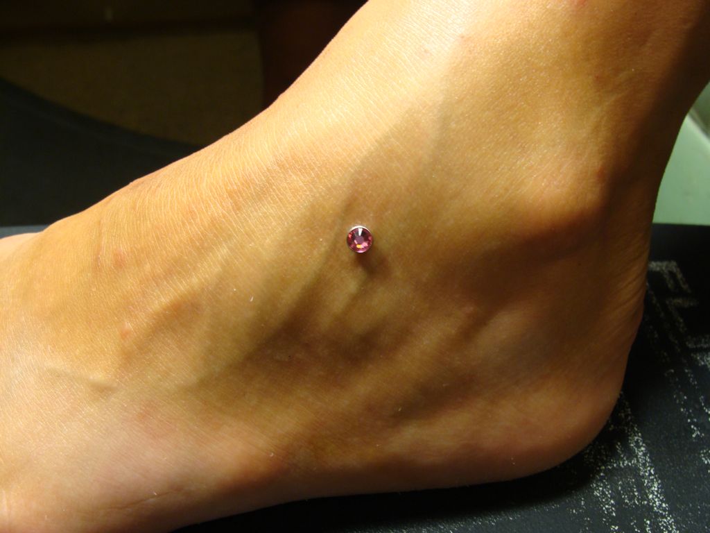 Pink Dermal Anchoring Piercing On Foot